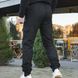 Зимові чоловічі Штани на флісі з кишенями / Утеплені Брюки Карго чорні розмір S 1555138358bls-S фото 4